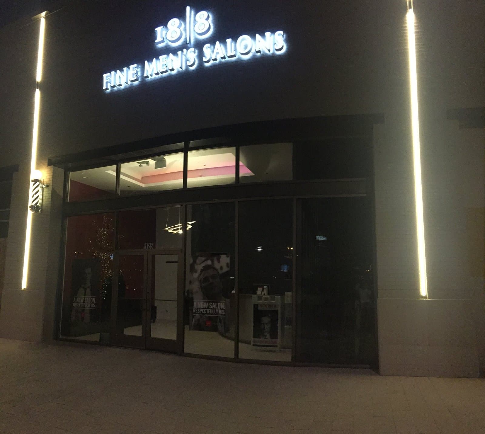18|8 Fine Men's Salons storefront at Preston Hollow Village in Dallas at night