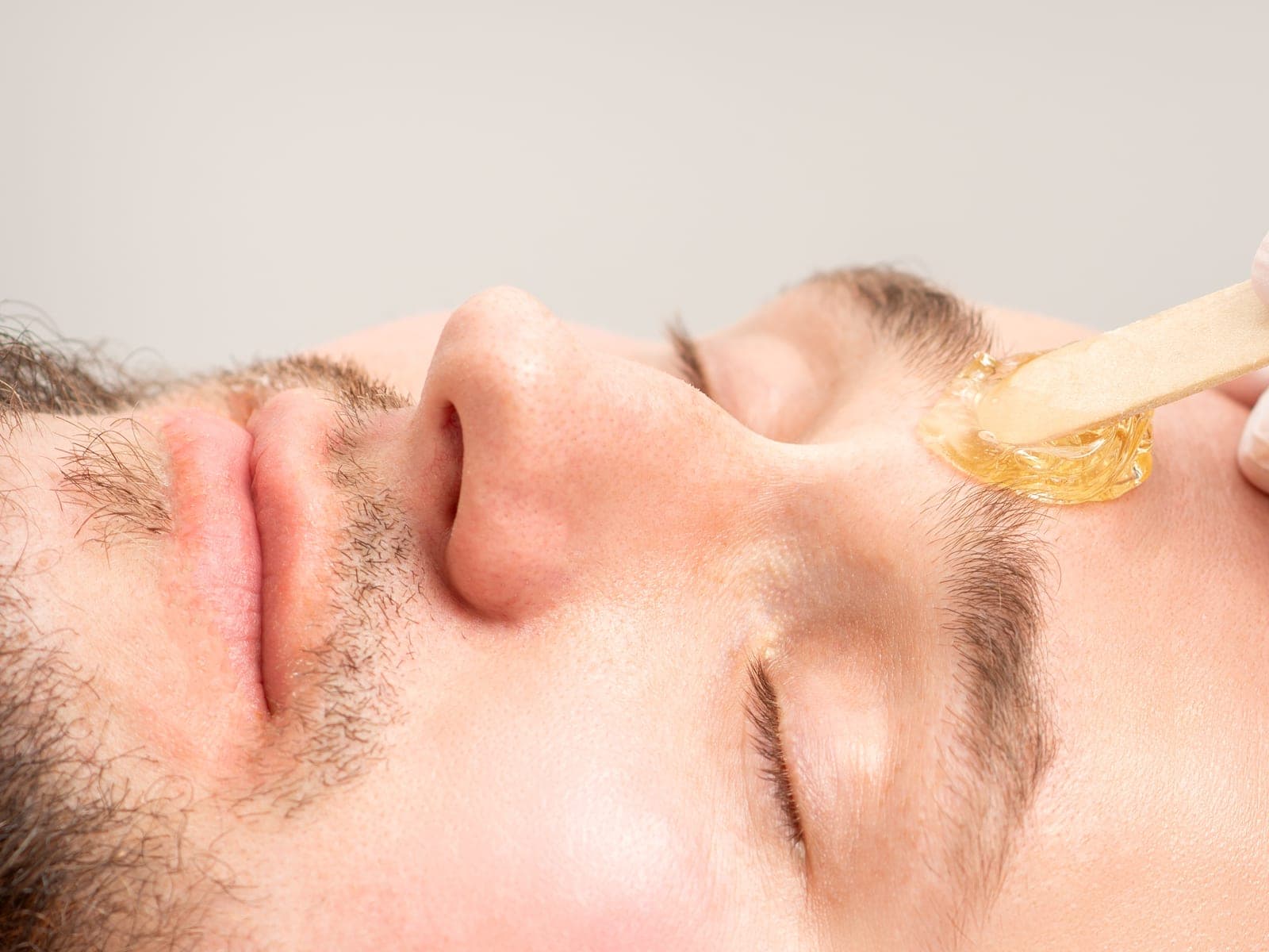 Men's eyebrow and grooming waxing service at 18|8 Fine Men's Salons in Dallas