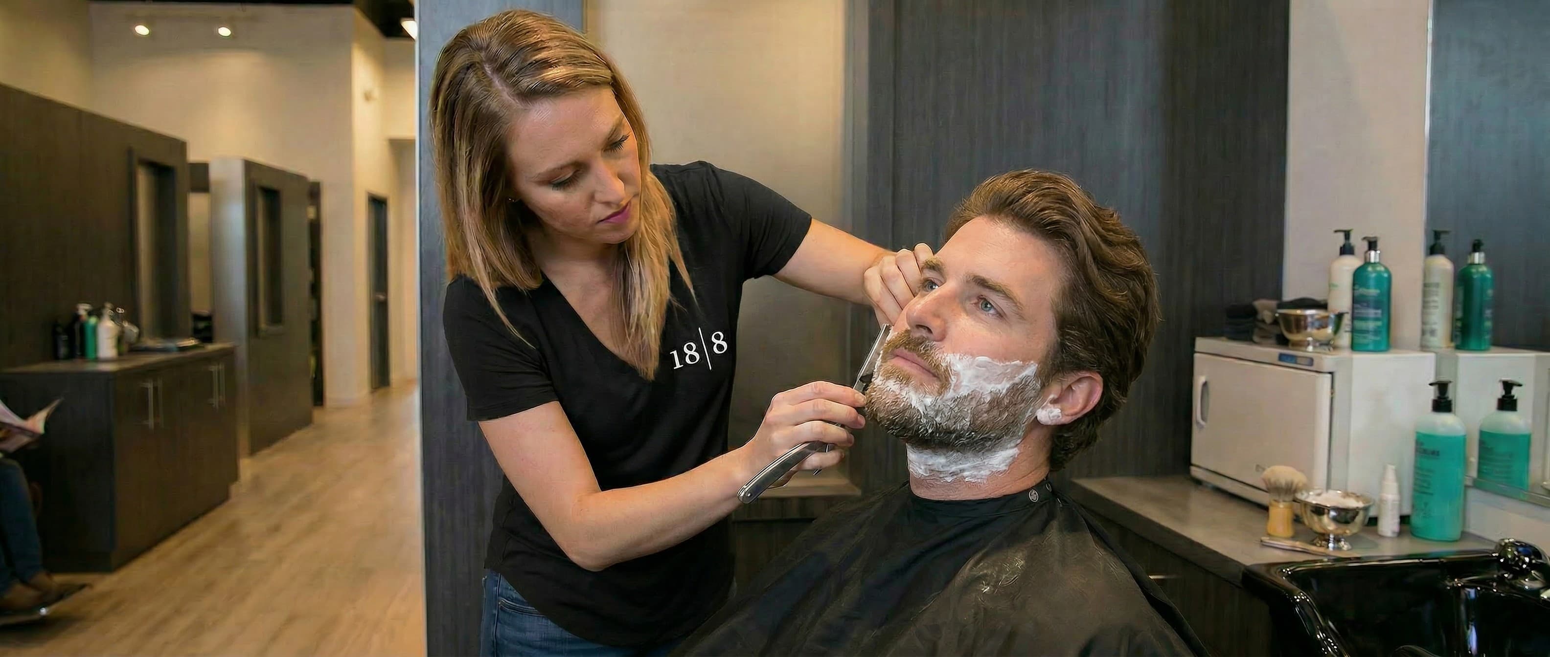 Classic hot-towel straight-razor shave at a Dallas men's salon